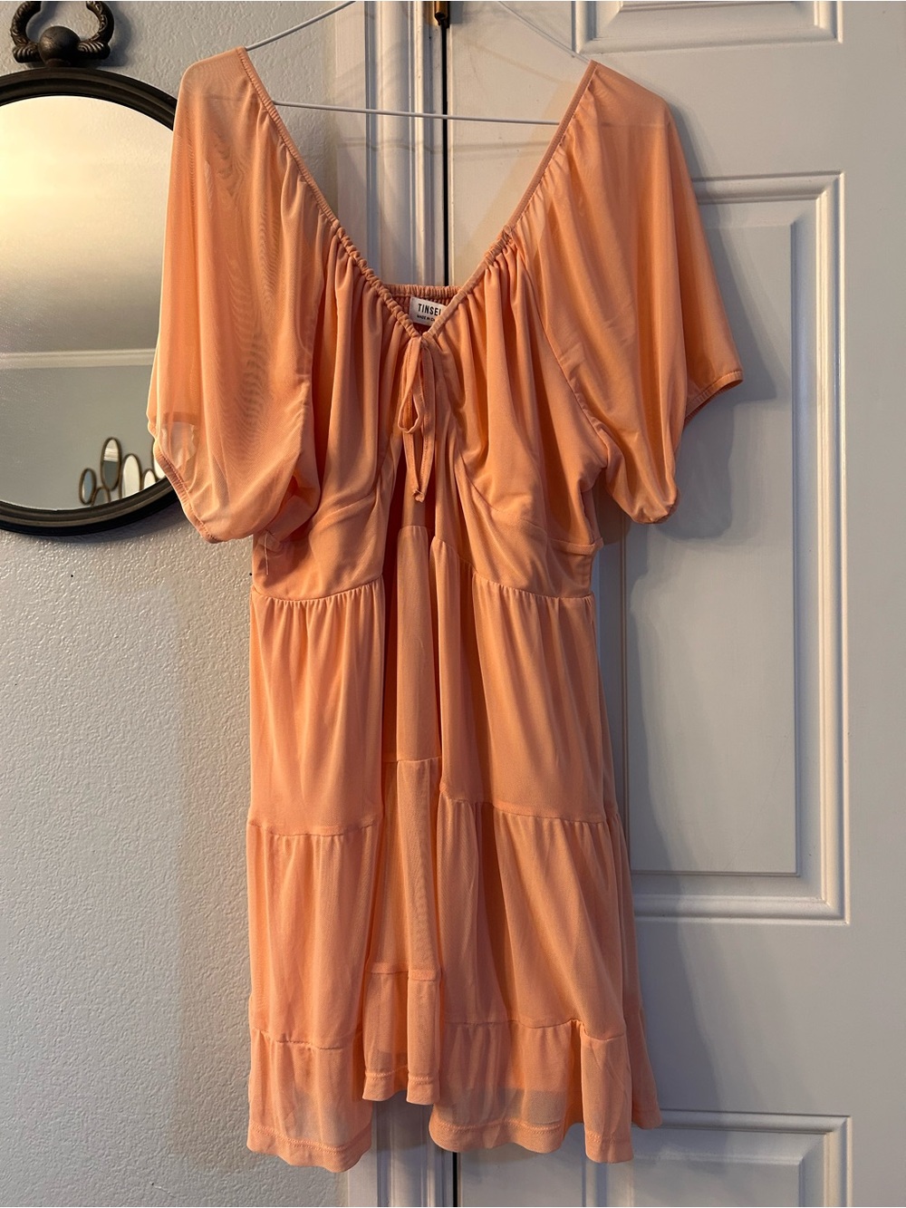 Tinsel Peach Tiered Mini Dress with Tie Neck